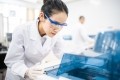 A female scientist conducting lab research. © Getty Images 